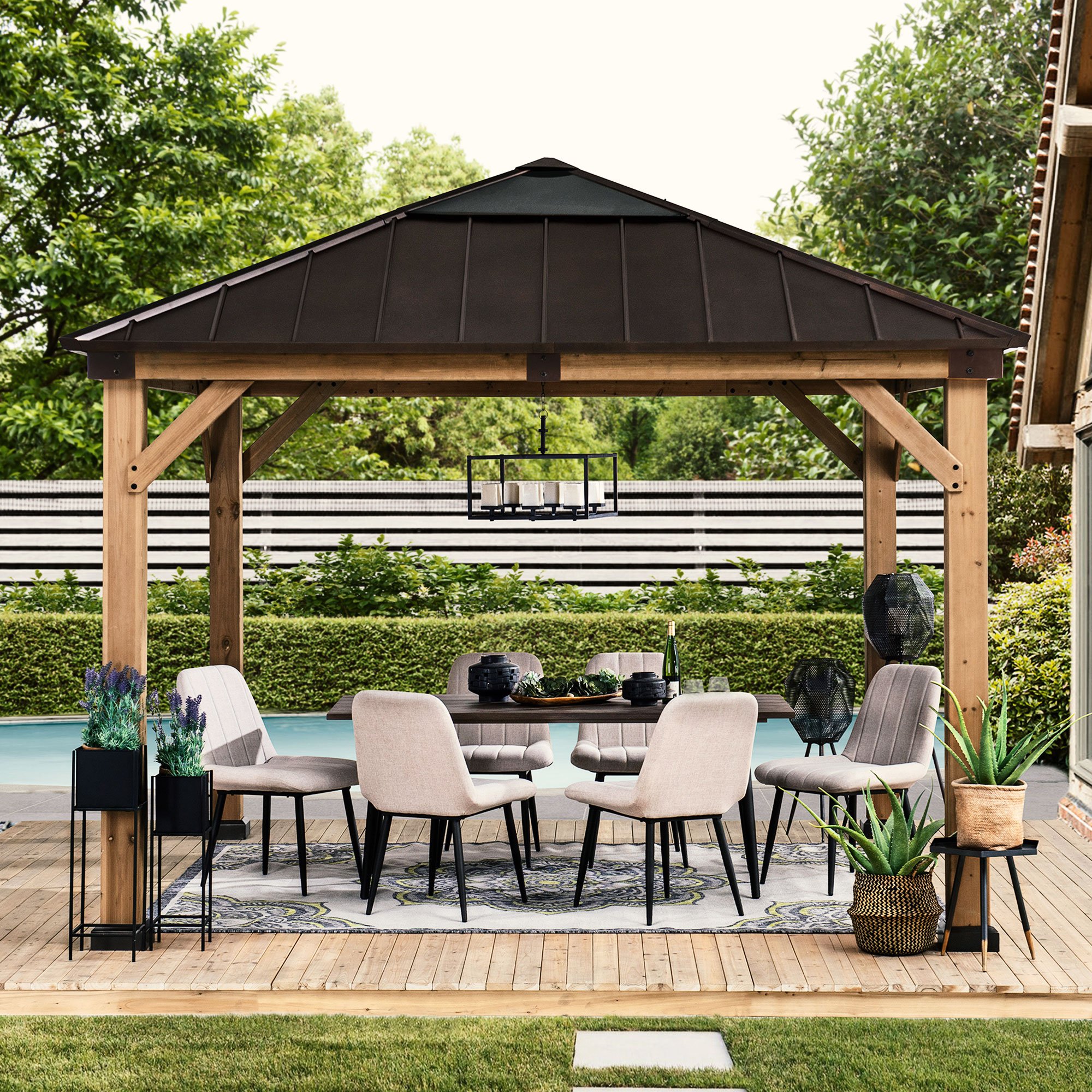 Sunjoy 11 ft. x 11 ft. Cedar Framed Gazebo with Brown Steel and Polycarbonate Hip Roof Hardtop